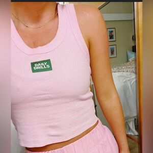 ISO PINK DAILY DRILLS TANK. WILLING TO PAY 150!!!